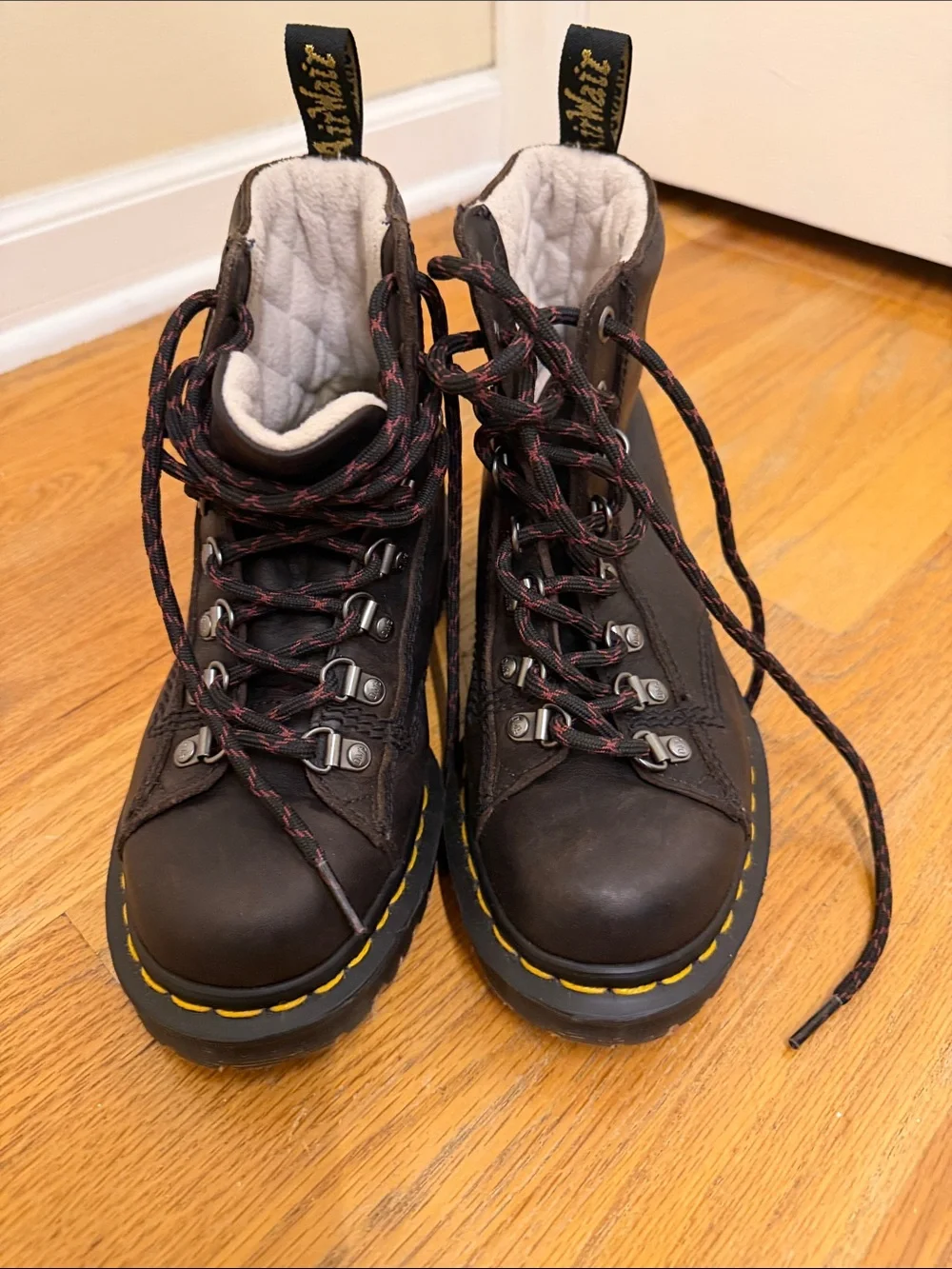 Dr. Martens Black Leather Hiking-Style Boots with Yellow Stitching